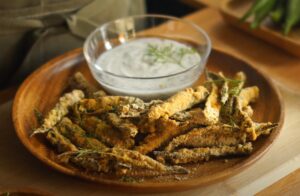 A plate of golden-brown okra fries
